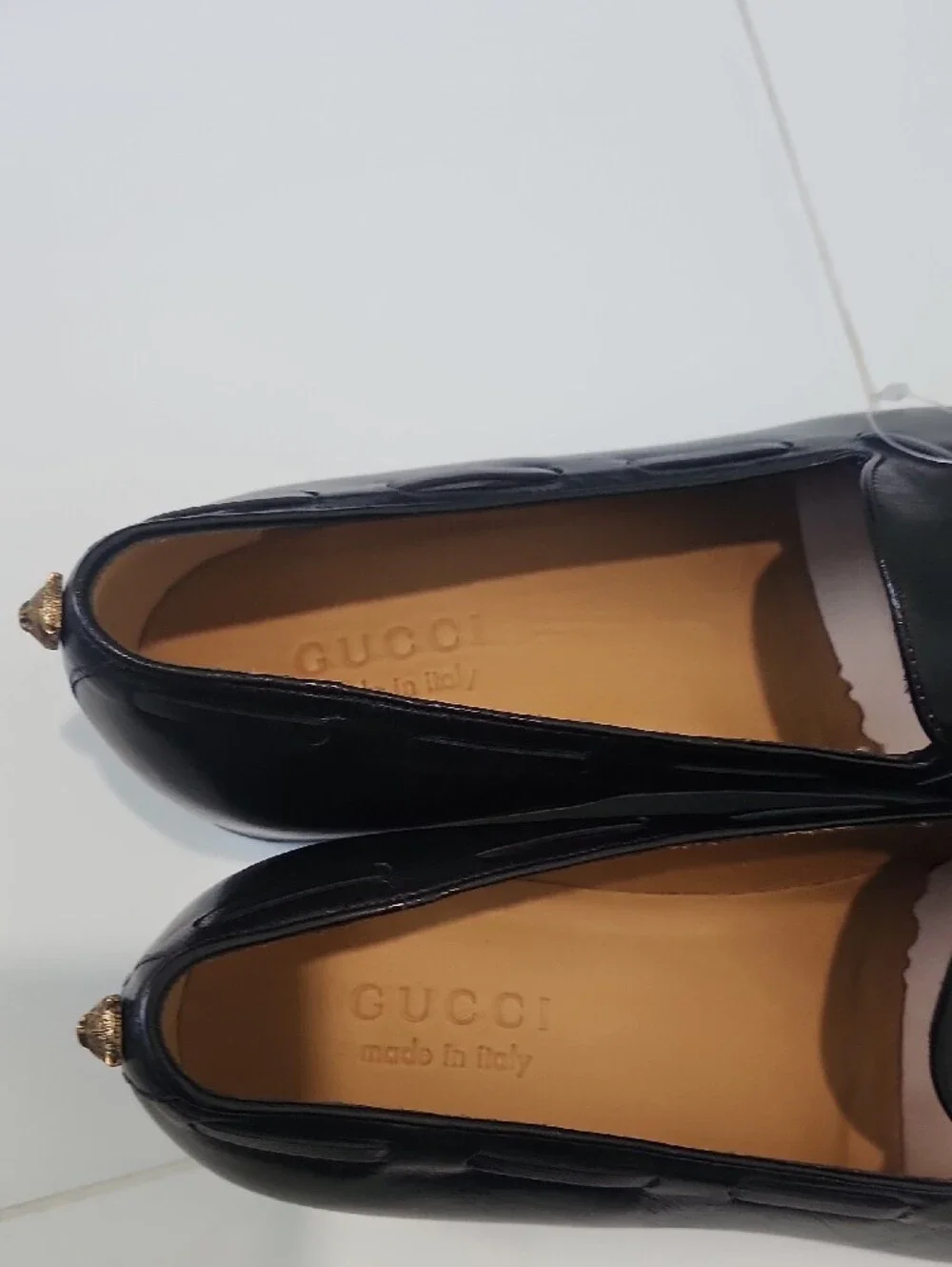 Gucci Black Leather Tassel Loafers with Gold Cat Accent